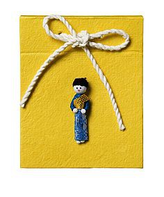 Notitieboekje met Thais poppetje